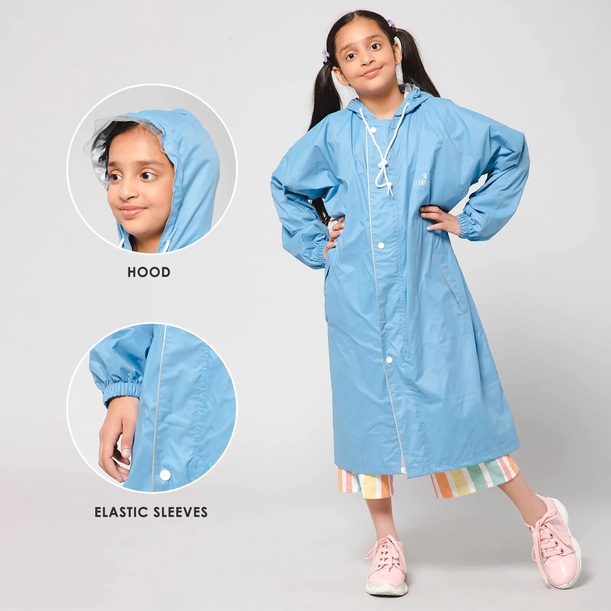 THE CLOWNFISH Cloud Chaser Series Kids Raincoat Waterproof Polyester Double Coating Reversible Longcoat with Hood and Reflector Logo at Back. Printed Plastic Pouch. Kid Age-7-8 years (Skyblue)